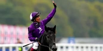 Dettori embracing spectator view on his Royal Ascot return